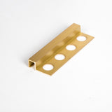 brass tile strip