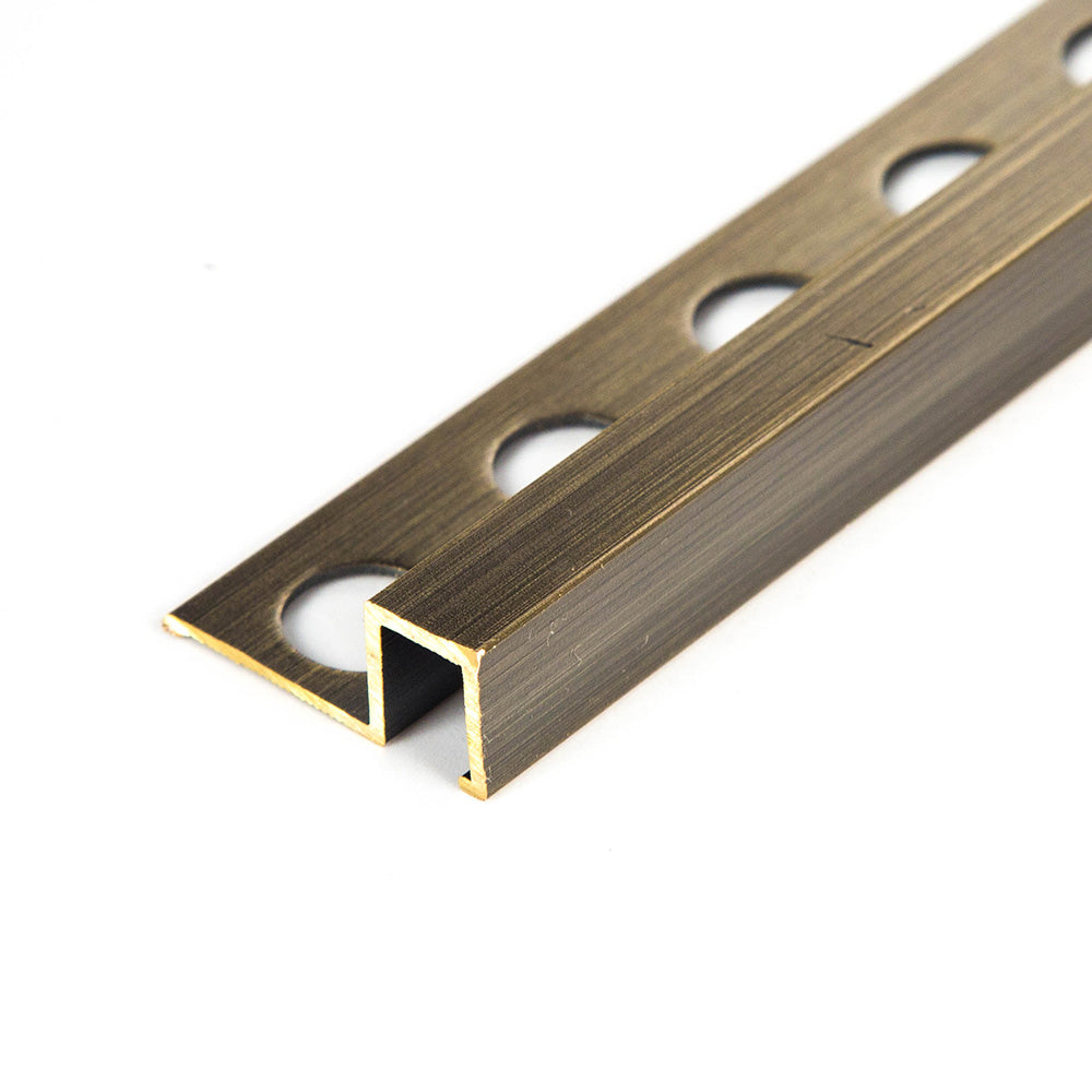 brushed brass tile trim