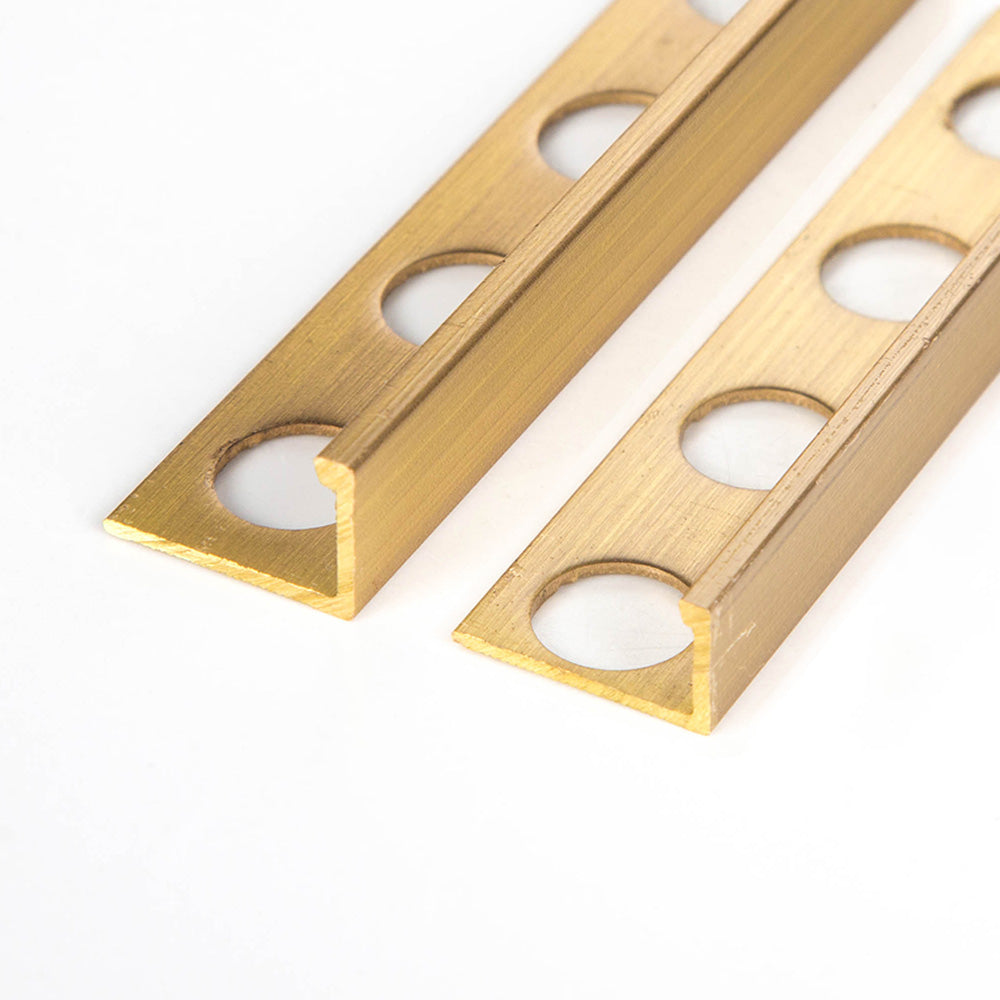 brushed brass tile trim